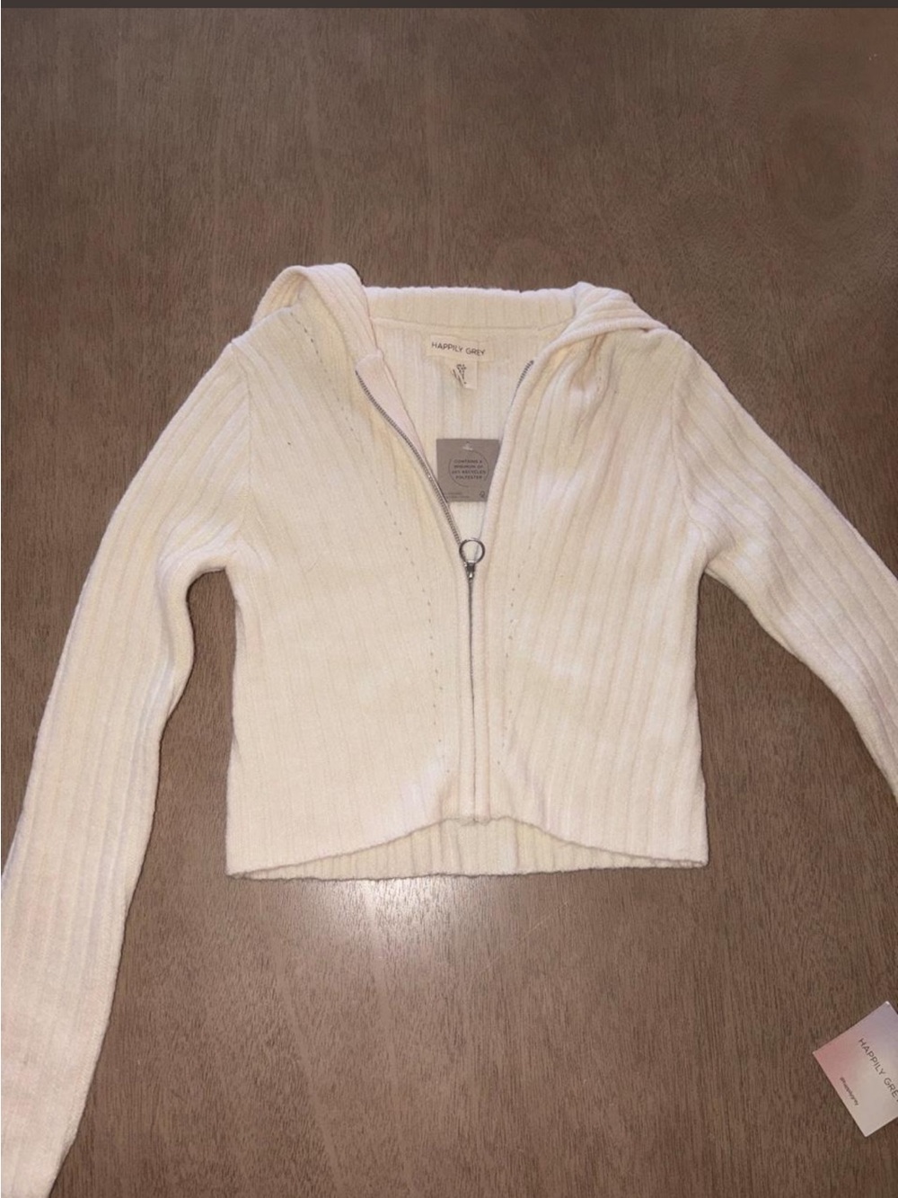 Cream zip up cardigan with cape like hood